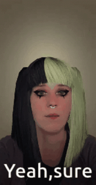 Woman With Black And Green Hair Making Funny Face Saying Yeah Sure GIF