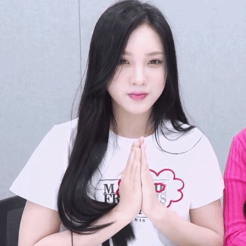 Woman With Black Hair In White Mr Shirt GIF