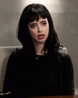 Woman With Black Hair Making Face GIF