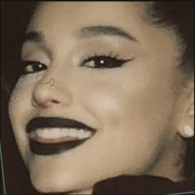 Woman With Black Lipstick And Earrings GIF