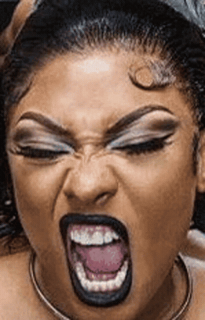 Woman With Black Lipstick Making Funny Face GIF