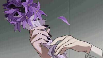 Woman With Black Nails Holding Purple Flowers GIF