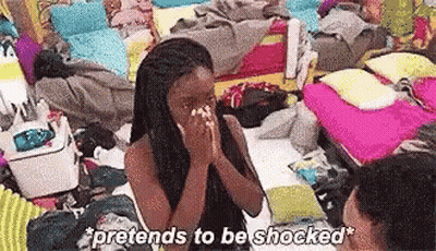 Woman With Blanket On Face In Messy Room GIF