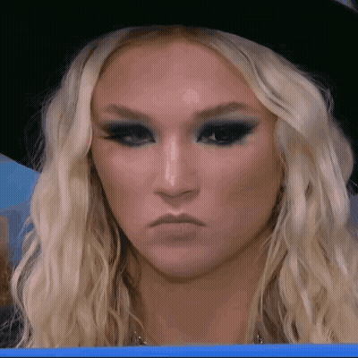 Woman With Blonde Hair And Black Hat GIF