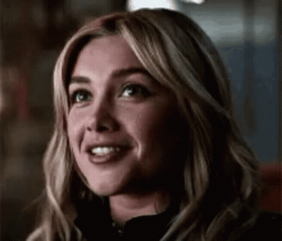 Woman With Blonde Hair And Black Jacket GIF