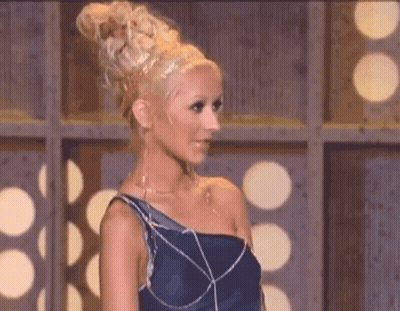 Woman With Blonde Hair And Blue Dress GIF