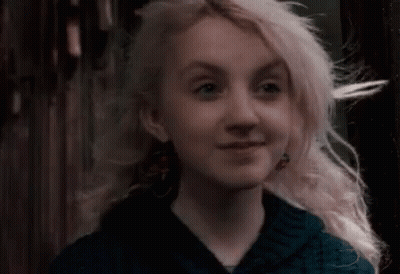 Woman With Blonde Hair And Blue Shirt GIF