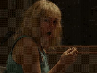 Woman With Blonde Hair And Blue Tank Top Surprised GIF