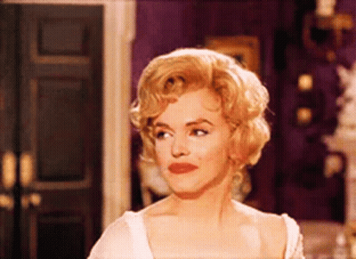 Woman With Blonde Hair And Red Lipstick GIF