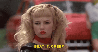 Woman With Blonde Hair And Red Lipstick Saying Beat It Creep GIF