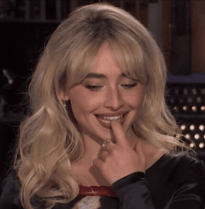Woman With Blonde Hair And Ring GIF