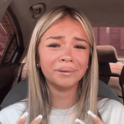 Woman With Blonde Hair Crying In Car GIF