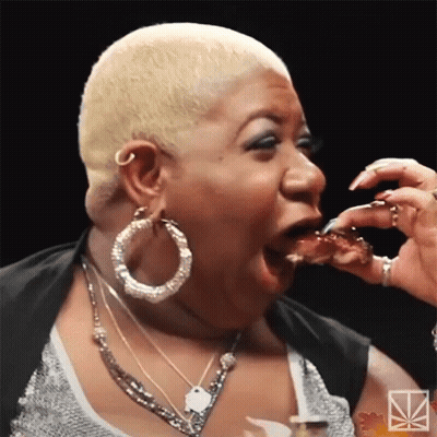 Woman With Blonde Hair Eating Food GIF