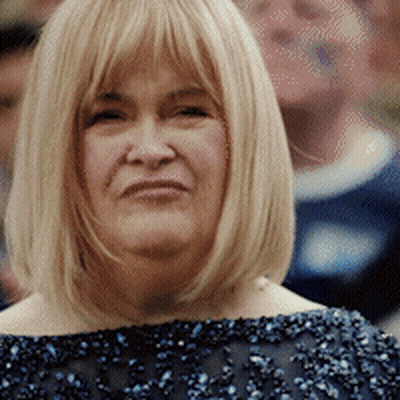 Woman With Blonde Hair In Blue Lace Dress GIF