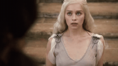 Woman With Blonde Hair In White Top GIF