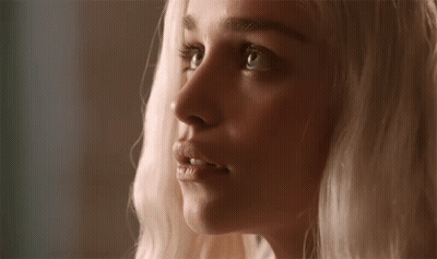 Woman With Blonde Hair Looking Sideways GIF