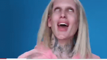 Woman With Blonde Hair Making Funny Face GIF
