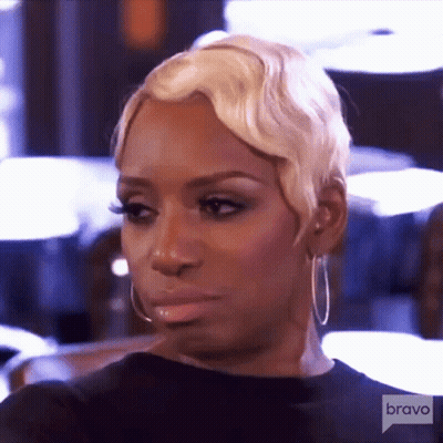 Woman With Blonde Hair Making Funny Face GIF