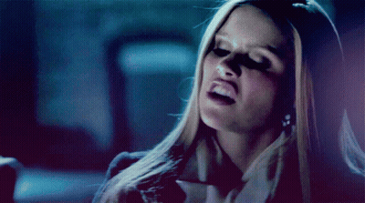 Woman With Blonde Hair Making Funny Face GIF