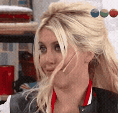 Woman With Blonde Hair Making Funny Face GIF