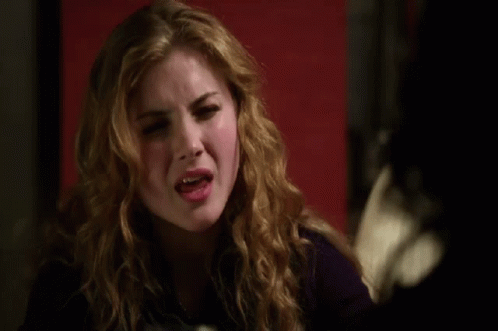 Woman With Blonde Hair Making Funny Face GIF
