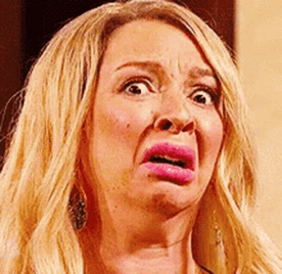 Woman With Blonde Hair Making Funny Face GIF