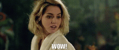 Woman With Blonde Hair Saying Wow GIF