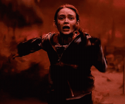 Woman With Blood on Face in Red Field