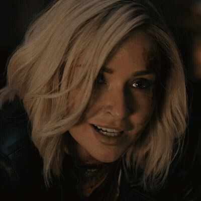 Woman With Blood On Face Smiling GIF