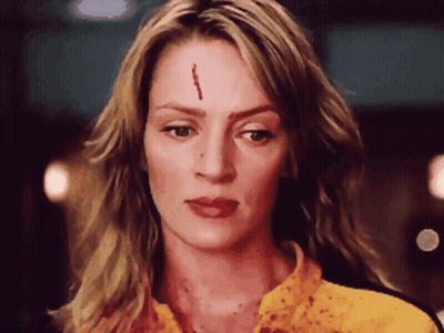 Woman With Bloody Spot On Forehead GIF