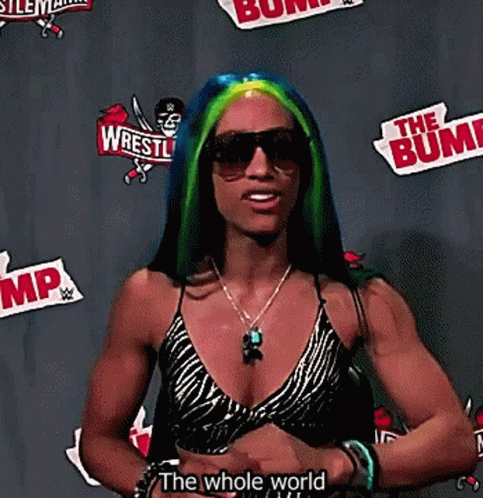 Woman With Blue And Green Hair In Front Of The Whole World GIF
