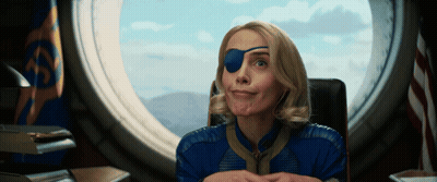 Woman With Blue Eye Patch Looking Out Window GIF