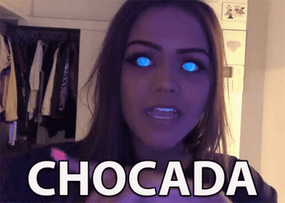 Woman With Blue Eyes And Chocada On Face GIF