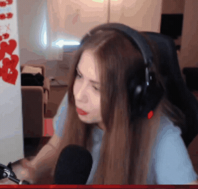 Woman With Blue Eyes In Chain Mail Armor GIF