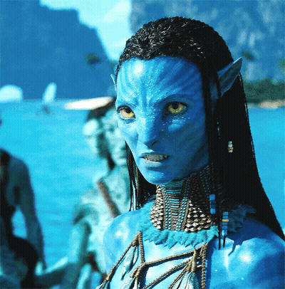 Woman With Blue Face And Yellow Eyes GIF