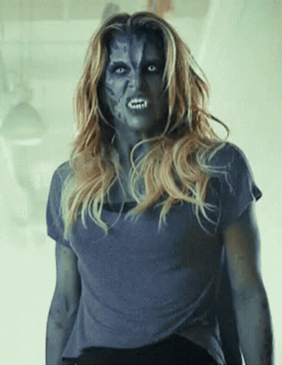 Woman With Blue Face Paint GIF