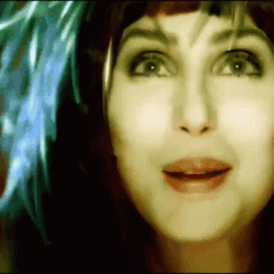 Woman With Blue Feather In Hair GIF