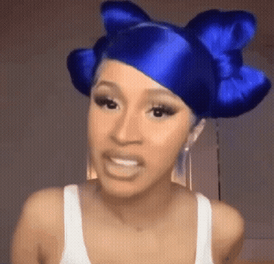 Woman With Blue Hair And Bow Talking GIF