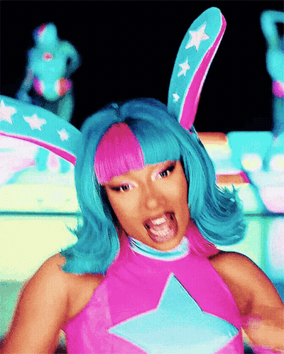 Woman With Blue Hair And Bunny Ears In Pink Star Top GIF