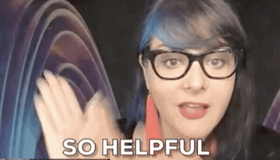 Woman With Blue Hair And Glasses Making Funny Face Saying So Helpful GIF