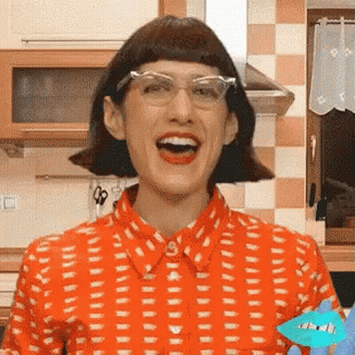 Woman With Blue Hair And I Shirt Holding Gun GIF