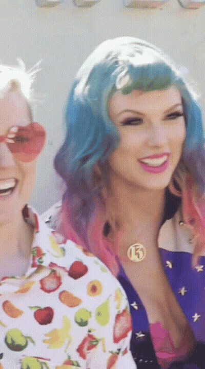 Woman With Blue Hair And Number 13 Necklace GIF