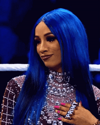 Woman With Blue Hair And Pink Nails Wearing Ring GIF