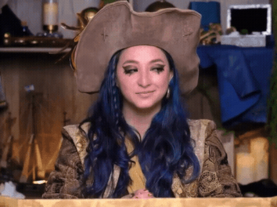 Woman With Blue Hair And Pirate Hat GIF