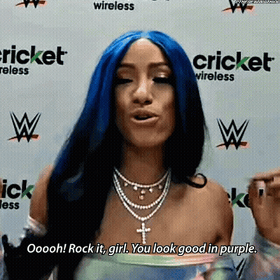 Woman With Blue Hair At Cricket Wireless Wall GIF