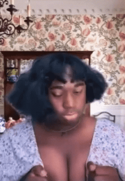 Woman With Blue Hair By Floral Wallpaper GIF