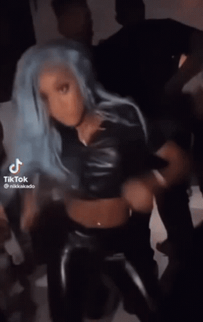Woman With Blue Hair Dancing In Front Of Crowd GIF