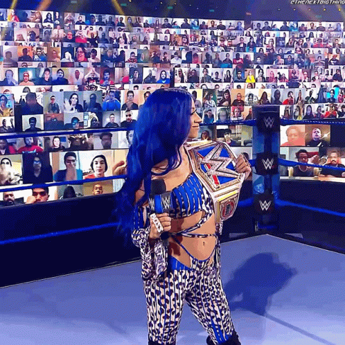 Woman With Blue Hair Holding Championship GIF