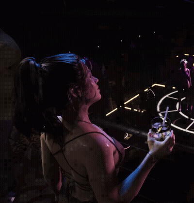 Woman With Blue Hair Holding Drink In Front Of Sign Saying N GIF