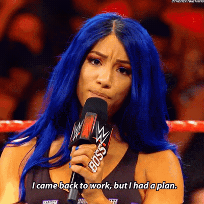 Woman With Blue Hair Holding Microphone Saying Boss GIF